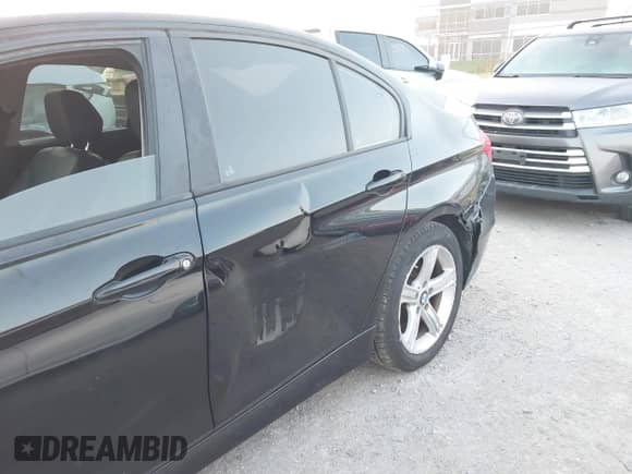 2014 BMW 3 Series 328i with VIN WBA3C1C59EK107882, listed as a IAAI auction lot 43398971 with 187,068 mi miles and . Bid and sale history available at DreamBid. Image 6.