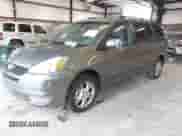 2004 Toyota Sienna XLE z VIN 5TDBA22C14S015263, wystawiony jako IAAI lot #43559835 z przebiegiem 114 153 mil mil oraz . Historia ofert i sprzedaży dostępna na DreamBid. Obrazek 2.