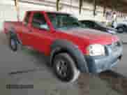 2002 Nissan Frontier XE with VIN 1N6ED26T52C341691, listed as a Copart auction lot 52446055 with 271,761 mi miles and Salvage title. Bid and sale history available at DreamBid. Image 4.