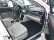 2014 Toyota Camry SE with VIN 4T1BF1FK2EU304772, listed as a IAAI auction lot 43352345 with 185,853 mi miles and . Bid and sale history available at DreamBid. Image 5.