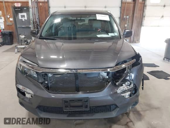 2018 Honda Pilot LX с VIN 5FNYF6H1XJB015593, выставлен на аукционе IAAI как лот 43266013 с пробегом 44 737 миль миль и . История ставок и продаж доступна на DreamBid. Изображение 12.