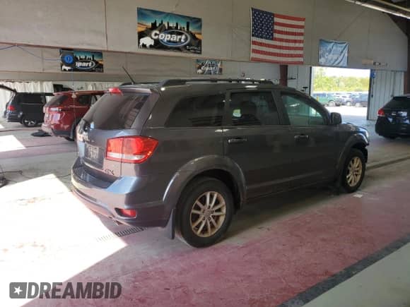 2015 Dodge Journey SXT with VIN 3C4PDDBG0FT651497, listed as a Copart auction lot 71617105 with 92,765 mi miles and Salvage title. Bid and sale history available at DreamBid. Image 3.