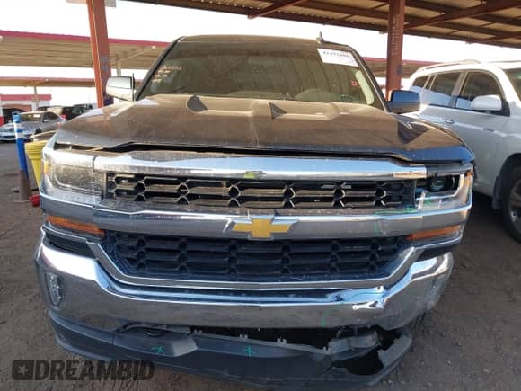 2018 Chevrolet Silverado 1500 LT with VIN 3GCUKREC2JG234849, listed as a IAAI auction lot 42432401 with 52,087 mi miles and . Bid and sale history available at DreamBid. Image 12.