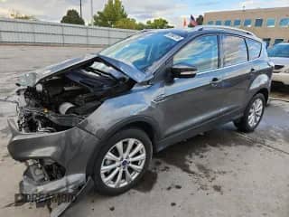 2017 Ford Escape Titanium с VIN 1FMCU9JD4HUD11289, выставлен на аукционе Copart как лот 85590715 с пробегом 78 983 миль миль и Списание • Salvage title. История ставок и продаж доступна на DreamBid. Изображение 1.