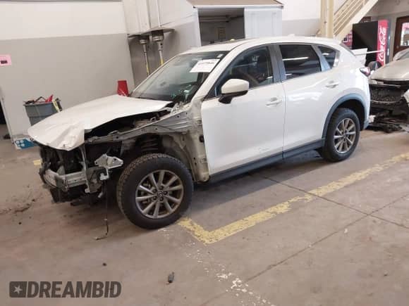 2023 Mazda CX-5 S Preferred z VIN JM3KFBCM4P0240168, wystawiony jako IAAI lot #41979846 z przebiegiem 38 648 mil mil oraz . Historia ofert i sprzedaży dostępna na DreamBid. Obrazek 2.