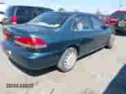 2002 Honda Accord LX with VIN JHMCG66522C014027, listed as a IAAI auction lot 42910646 with 225,058 mi miles and . Bid and sale history available at DreamBid. Image 4.