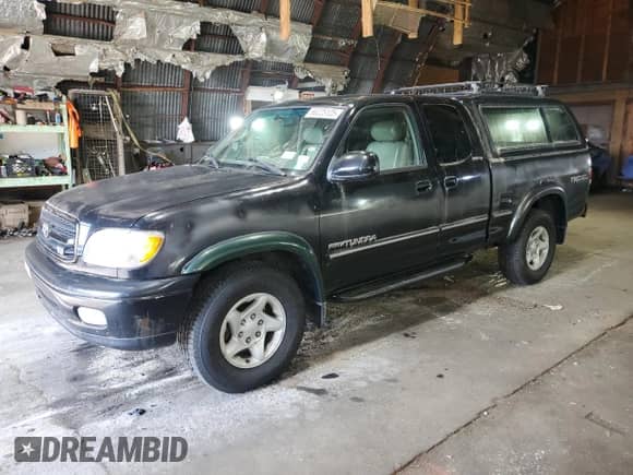 2001 Toyota Tundra Limited z VIN 5TBBT48141S154805, wystawiony jako Copart lot #66225125 z przebiegiem 216 119 mil mil oraz Czysty tytuł • Clean title. Historia ofert i sprzedaży dostępna na DreamBid. Obrazek 1.