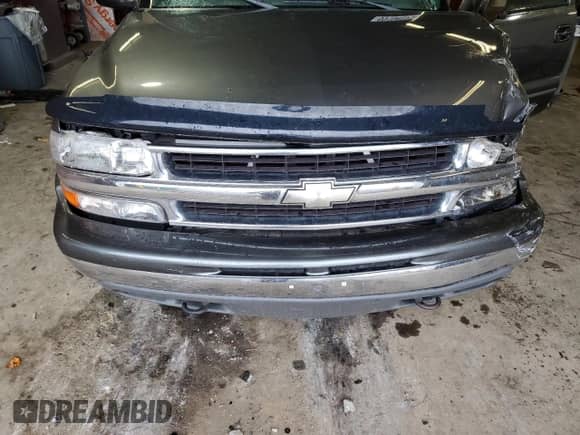 2001 Chevrolet Suburban LS z VIN 3GNFK16T11G251075, wystawiony jako Copart lot #69108375 z przebiegiem 186 600 mil mil oraz Szkoda całkowita • Salvage title. Historia ofert i sprzedaży dostępna na DreamBid. Obrazek 12.