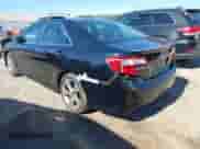 2014 Toyota Camry SE Sport with VIN 4T1BF1FK0EU320324, listed as a IAAI auction lot 43368424 with 122,618 mi miles and . Bid and sale history available at DreamBid. Image 3.