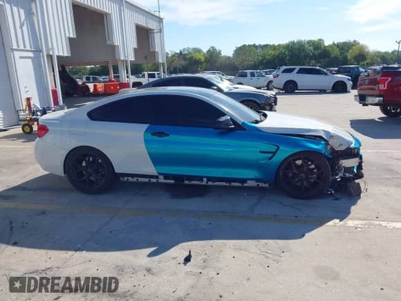 2018 BMW 4 Series 440i with VIN WBA4W7C59JAB87539, listed as a IAAI auction lot 41895024 with 73,228 mi miles and . Bid and sale history available at DreamBid. Image 13.