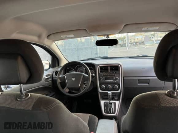 2010 Dodge Caliber SXT с VIN 1B3CB4HA1AD579409, выставлен на аукционе Copart как лот 91408935 с пробегом 100 311 миль миль и Чистый • Clean title. История ставок и продаж доступна на DreamBid. Изображение 9.