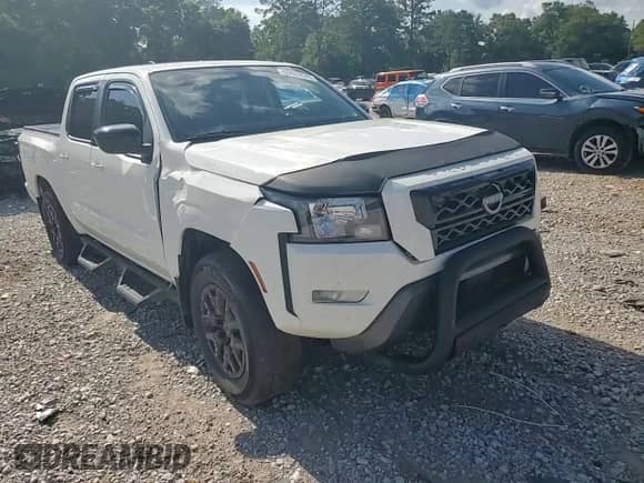 2023 Nissan Frontier SV z VIN 1N6ED1EK8PN618543, wystawiony jako Copart lot #60609945 z przebiegiem Nie podano mil oraz Szkoda całkowita • Salvage title. Historia ofert i sprzedaży dostępna na DreamBid. Obrazek 13.
