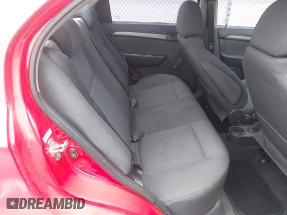 2009 Chevrolet Aveo 1LT z VIN KL1TD56E89B403931, wystawiony jako IAAI lot #42623520 z przebiegiem 221 985 mil mil oraz . Historia ofert i sprzedaży dostępna na DreamBid. Obrazek 8.