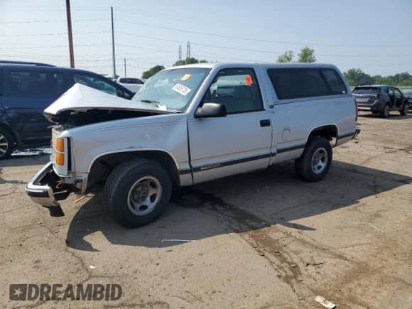 1995 GMC Sierra 1500 с VIN 1GTEC14H9SZ530842, выставлен на аукционе Copart как лот 64565735 с пробегом 235 571 миль миль и Чистый • Clean title. История ставок и продаж доступна на DreamBid. Изображение 1.
