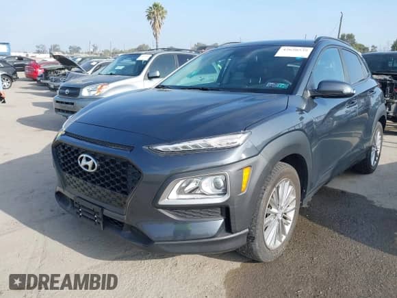 2020 Hyundai Kona SEL with VIN KM8K2CAA0LU528030, listed as a IAAI auction lot 42650539 with 33,430 mi miles and . Bid and sale history available at DreamBid. Image 2.