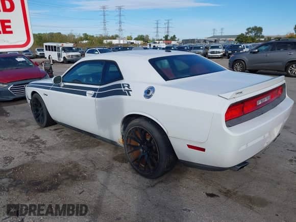 2013 Dodge Challenger R/T Plus z VIN 2C3CDYBTXDH531266, wystawiony jako IAAI lot #43506450 z przebiegiem 74 712 mil mil oraz . Historia ofert i sprzedaży dostępna na DreamBid. Obrazek 3.