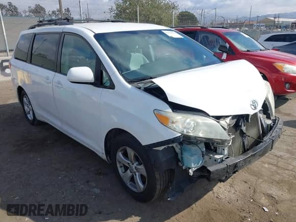 2015 Toyota Sienna LE with VIN 5TDKK3DC9FS574529, listed as a IAAI auction lot 43378279 with 169,347 mi miles and . Bid and sale history available at DreamBid. Image 1.