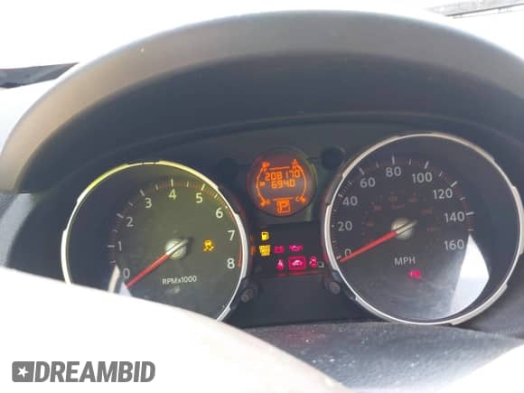 2009 Nissan Rogue S with VIN JN8AS58T89W321549, listed as a IAAI auction lot 42904376 with 208,170 mi miles and . Bid and sale history available at DreamBid. Image 7.