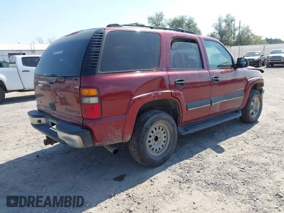 2002 Chevrolet Tahoe LT z VIN 1GNEK13Z52J186218, wystawiony jako IAAI lot #43062315 z przebiegiem 244 320 mil mil oraz . Historia ofert i sprzedaży dostępna na DreamBid. Obrazek 4.