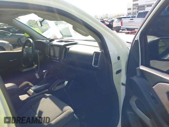 2024 Nissan Frontier Pro-X with VIN 1N6ED1EJ0RN644659, listed as a IAAI auction lot 43106313 with 20,472 mi miles and . Bid and sale history available at DreamBid. Image 5.