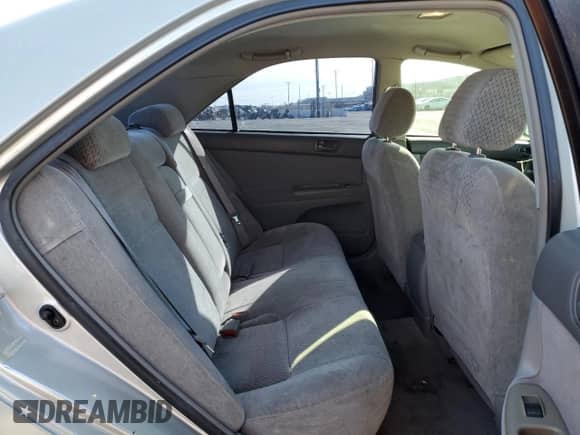2003 Toyota Camry XLE z VIN 4T1BE32K33U148727, wystawiony jako Copart lot #86108185 z przebiegiem 211 130 mil mil oraz Szkoda całkowita • Salvage title. Historia ofert i sprzedaży dostępna na DreamBid. Obrazek 10.
