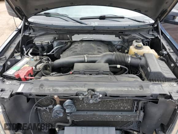 2013 Ford F-150 Lariat с VIN 1FTFW1ET1DKD50667, выставлен на аукционе Copart как лот 70038385 с пробегом 120 253 миль миль и Списание • Salvage title. История ставок и продаж доступна на DreamBid. Изображение 11.