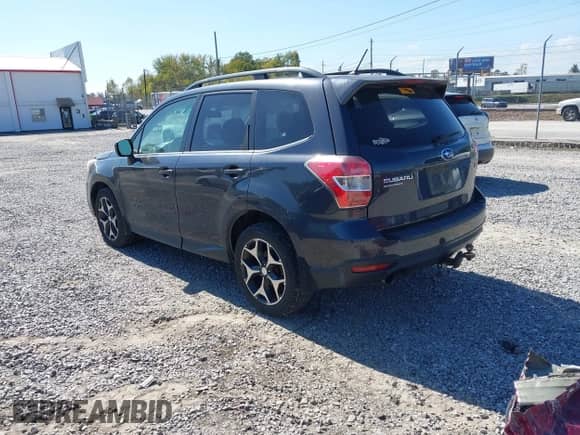 2014 Subaru Forester XT Premium with VIN JF2SJGDC2EH434742, listed as a IAAI auction lot 43425567 with 171,973 mi miles and . Bid and sale history available at DreamBid. Image 3.