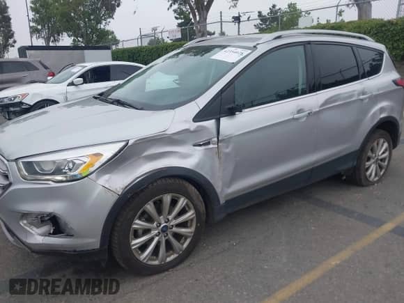 2017 Ford Escape Titanium с VIN 1FMCU0JD5HUB29838, выставлен на аукционе IAAI как лот 42354028 с пробегом 58 250 миль миль и . История ставок и продаж доступна на DreamBid. Изображение 6.