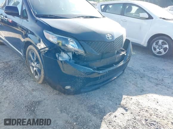 2014 Toyota Sienna SE with VIN 5TDXK3DC3ES494700, listed as a IAAI auction lot 42406747 with 73,410 mi miles and . Bid and sale history available at DreamBid. Image 6.
