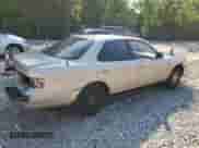 1994 Toyota Camry с VIN 4T1SK13E0RU413151, выставлен на аукционе Copart как лот 63446715 с пробегом 144 884 миль миль и Списание • Salvage title. История ставок и продаж доступна на DreamBid. Изображение 3.