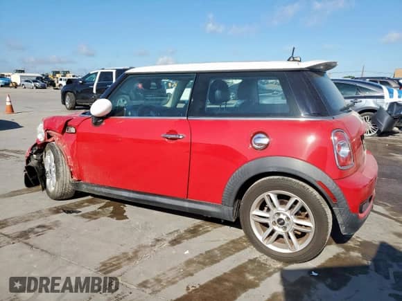 2012 MINI Hardtop S with VIN WMWSV3C50CTY25944, listed as a Copart auction lot 62837575 with 73,618 mi miles and Salvage title. Bid and sale history available at DreamBid. Image 2.