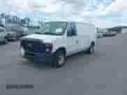 2010 Ford Econoline Cargo Commercial with VIN 1FTNE1EWXADA91492, listed as a IAAI auction lot 42707525 with 435,844 mi miles and . Bid and sale history available at DreamBid. Image 2.