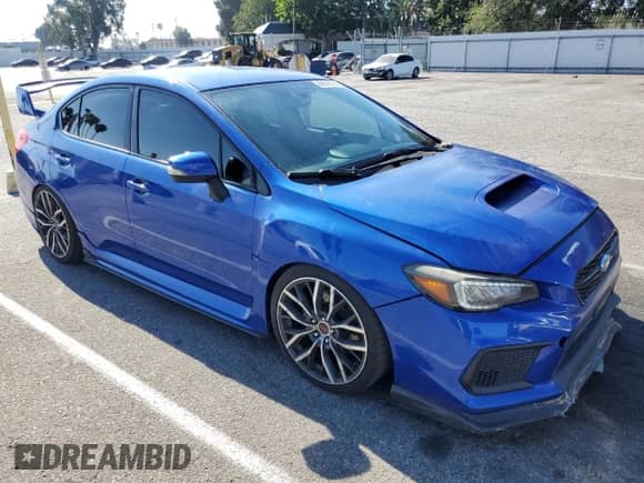 2017 Subaru WRX STI with VIN JF1VA2M6XH9834349, listed as a Copart auction lot 69678705 with 107,074 mi miles and Clean title. Bid and sale history available at DreamBid. Image 4.