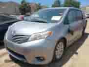 2015 Toyota Sienna XLE with VIN 5TDYK3DC0FS589947, listed as a IAAI auction lot 36567379 with 130,969 mi miles and . Bid and sale history available at DreamBid. Image 2.