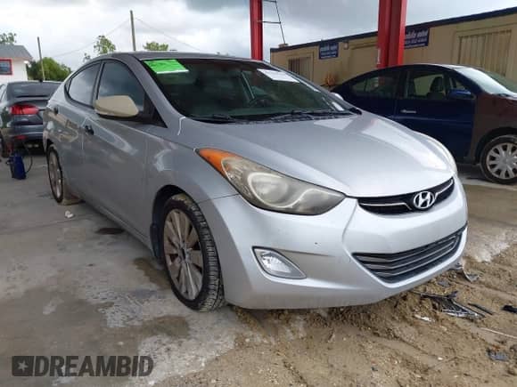 2012 Hyundai Elantra Limited z VIN KMHDH4AEXCU417274, wystawiony jako IAAI lot #43179736 z przebiegiem 146 671 mil mil oraz . Historia ofert i sprzedaży dostępna na DreamBid. Obrazek 1.