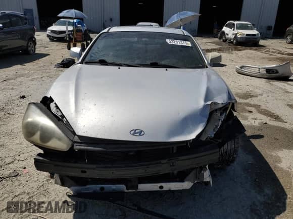 2008 Hyundai Tiburon GT с VIN KMHHN66F88U284030, выставлен на аукционе Copart как лот 53251315 с пробегом Не указан миль и Списание • Salvage title. История ставок и продаж доступна на DreamBid. Изображение 5.
