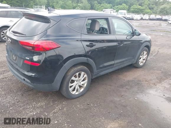 2019 Hyundai Tucson SE z VIN KM8J2CA43KU072898, wystawiony jako IAAI lot #42739926 z przebiegiem 73 368 mil mil oraz . Historia ofert i sprzedaży dostępna na DreamBid. Obrazek 4.