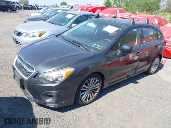2014 Subaru Impreza Premium with VIN JF1GPAD65E8281788, listed as a IAAI auction lot 43148025 with 143,266 mi miles and . Bid and sale history available at DreamBid. Image 2.