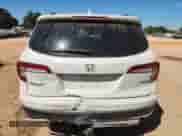 2019 Honda Pilot Touring 8-Passenger z VIN 5FNYF5H96KB015396, wystawiony jako Copart lot #70816345 z przebiegiem 108 095 mil mil oraz Szkoda całkowita • Salvage title. Historia ofert i sprzedaży dostępna na DreamBid. Obrazek 6.