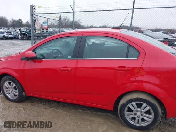 2016 Chevrolet Sonic LT with VIN 1G1JC5SB0G4125907, listed as a IAAI auction lot 41111451 with 95,887 mi miles and . Bid and sale history available at DreamBid. Image 14.