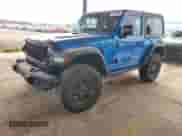 2024 Jeep Wrangler Sport S с VIN 1C4PJXAN8RW169420, выставлен на аукционе Copart как лот 62593945 с пробегом 5 164 миль миль и Списание • Salvage title. История ставок и продаж доступна на DreamBid. Изображение 1.