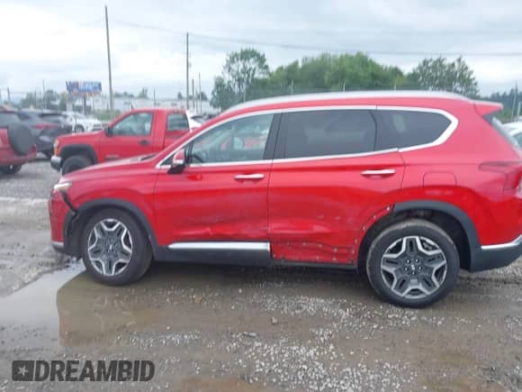 2021 Hyundai Santa Fe Limited with VIN 5NMS4DAL2MH331598, listed as a IAAI auction lot 42894530 with 90,670 mi miles and . Bid and sale history available at DreamBid. Image 14.
