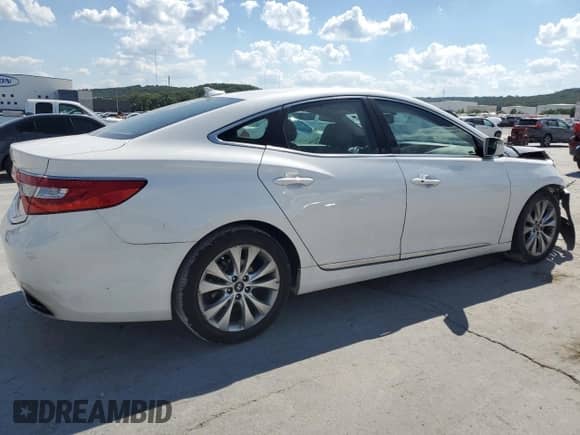 2013 Hyundai Azera с VIN KMHFG4JGXDA325761, выставлен на аукционе Copart как лот 70225975 с пробегом 126 944 миль миль и Списание • Salvage title. История ставок и продаж доступна на DreamBid. Изображение 3.