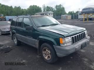 1996 Jeep Grand Cherokee with VIN 1J4EZ58Y7TC128302, listed as a IAAI auction lot 42643449 with 282,036 mi miles and . Bid and sale history available at DreamBid. Image 1.