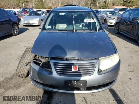 2005 Saturn ION ION 3 z VIN 1G8AL52F75Z141784, wystawiony jako Copart lot #87006514 z przebiegiem 100 916 mil mil oraz Szkoda całkowita • Salvage title. Historia ofert i sprzedaży dostępna na DreamBid. Obrazek 5.