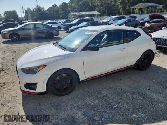 2022 Hyundai Veloster z VIN KMHT36AH0NU013791, wystawiony jako Copart lot #63401035 z przebiegiem 78 597 mil mil oraz Szkoda całkowita • Salvage title. Historia ofert i sprzedaży dostępna na DreamBid. Obrazek 1.