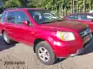 2006 Honda Pilot EX with VIN 5FNYF28476B037447, listed as a IAAI auction lot 43395591 with 165,099 mi miles and . Bid and sale history available at DreamBid. Image 1.