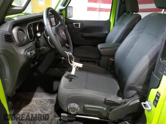 2021 Jeep Wrangler Sport S with VIN 1C4HJXAG2MW817025, listed as a Copart auction lot 61175485 with 55,387 mi miles and Salvage title. Bid and sale history available at DreamBid. Image 7.