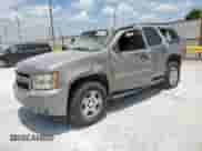 2007 Chevrolet Tahoe LS with VIN 1GNFC13C07J340290, listed as a Copart auction lot 61860395 with 207,574 mi miles and Salvage title. Bid and sale history available at DreamBid. Image 1.