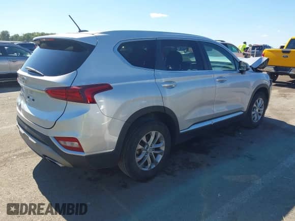 2019 Hyundai Santa Fe SE with VIN 5NMS23AD4KH100188, listed as a IAAI auction lot 43374582 with 88,759 mi miles and . Bid and sale history available at DreamBid. Image 4.
